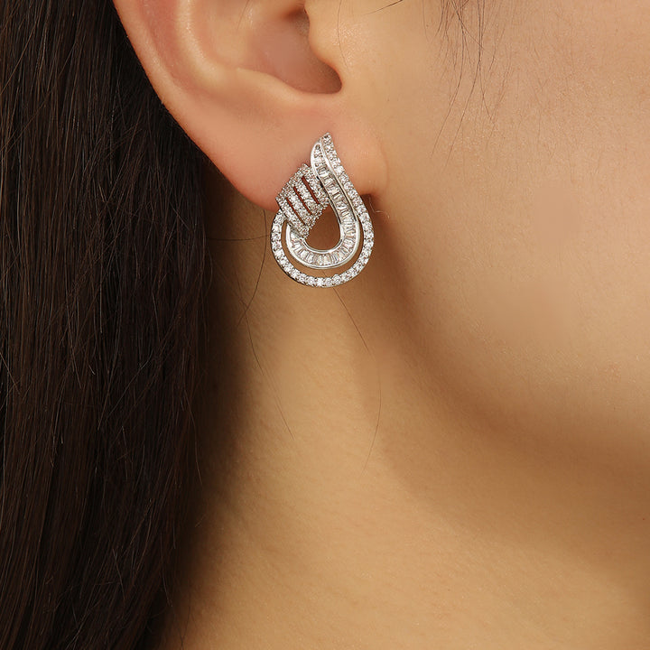 Exquisite Twinkle Twist Silver Earrings - Reet Pehal