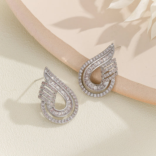 Exquisite Twinkle Twist Silver Earrings - Reet Pehal