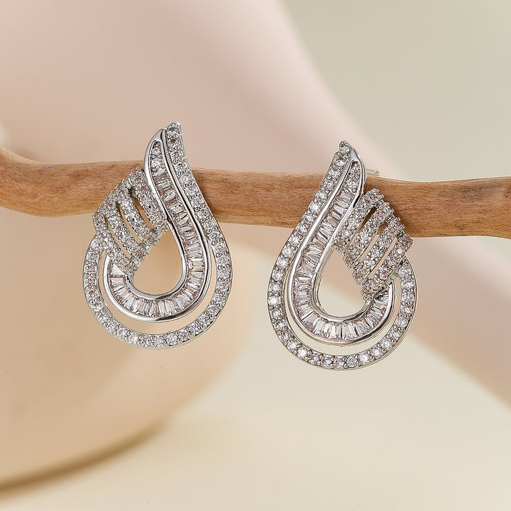 Exquisite Twinkle Twist Silver Earrings - Reet Pehal