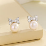 Load image into Gallery viewer, Halo Bow Pearl Earrings - Reet Pehal
