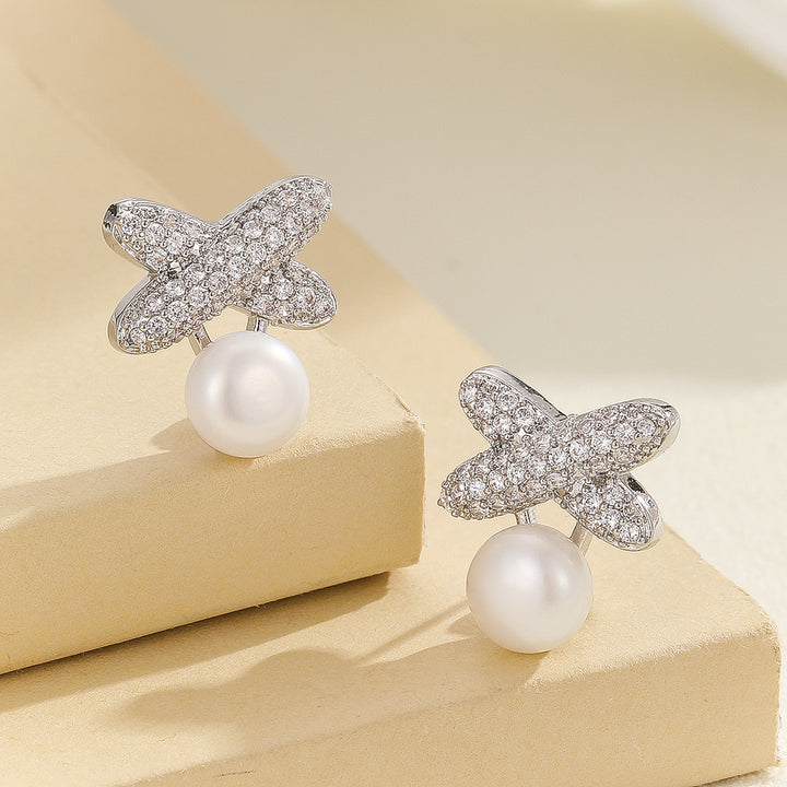 Sparkling Silver Butterfly Pearl Earrings - Reet Pehal