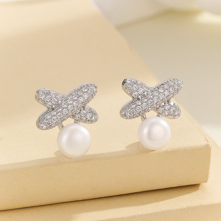 Sparkling Silver Butterfly Pearl Earrings - Reet Pehal