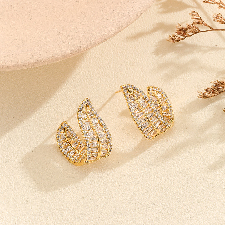 Sparkling Golden Leafy Curved Earrings - Reet Pehal