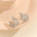 Load image into Gallery viewer, Sparkling Silver Leafy Curved Earrings - Reet Pehal
