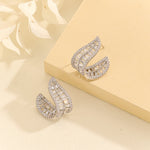 Load image into Gallery viewer, Sparkling Silver Leafy Curved Earrings - Reet Pehal
