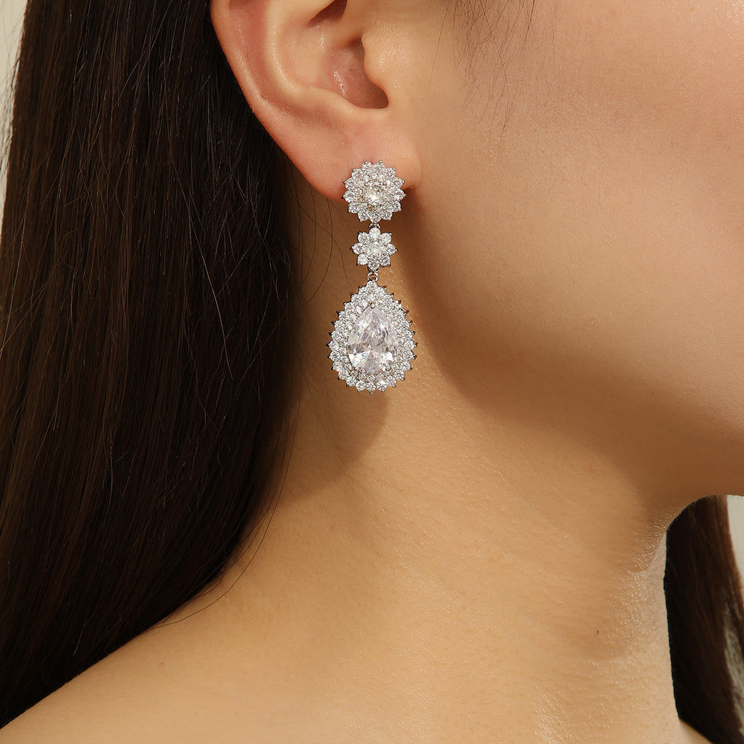Elegant Silver Floral Drop Earrings - Reet Pehal