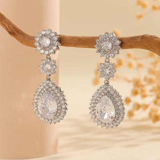 Elegant Silver Floral Drop Earrings - Reet Pehal