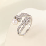 Load image into Gallery viewer, Radiant Ribbon Pearl Ring - Reet Pehal
