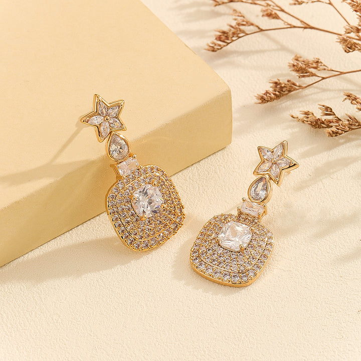 Graceful Golden Starlight Earrings - Reet Pehal