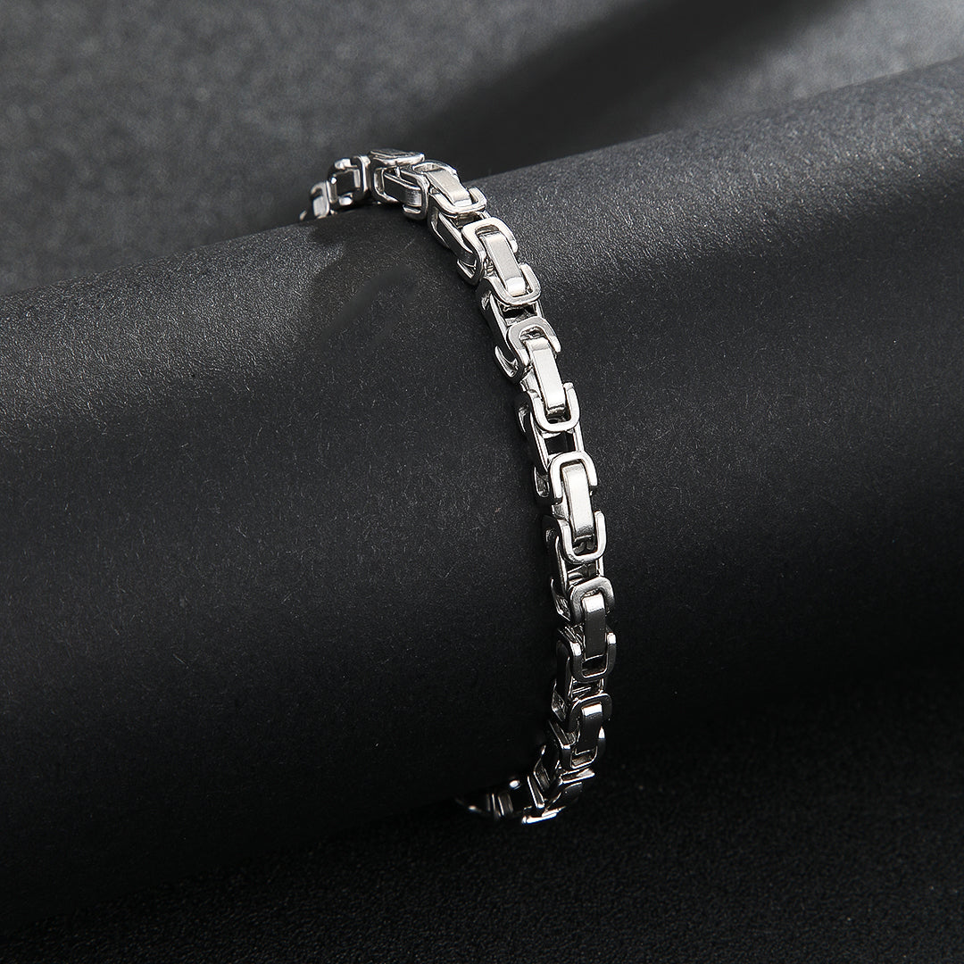 Daring Silver Interlock Bracelet