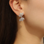 Load image into Gallery viewer, Alluring Silver Bow  Symphony Earrings - Reet Pehal
