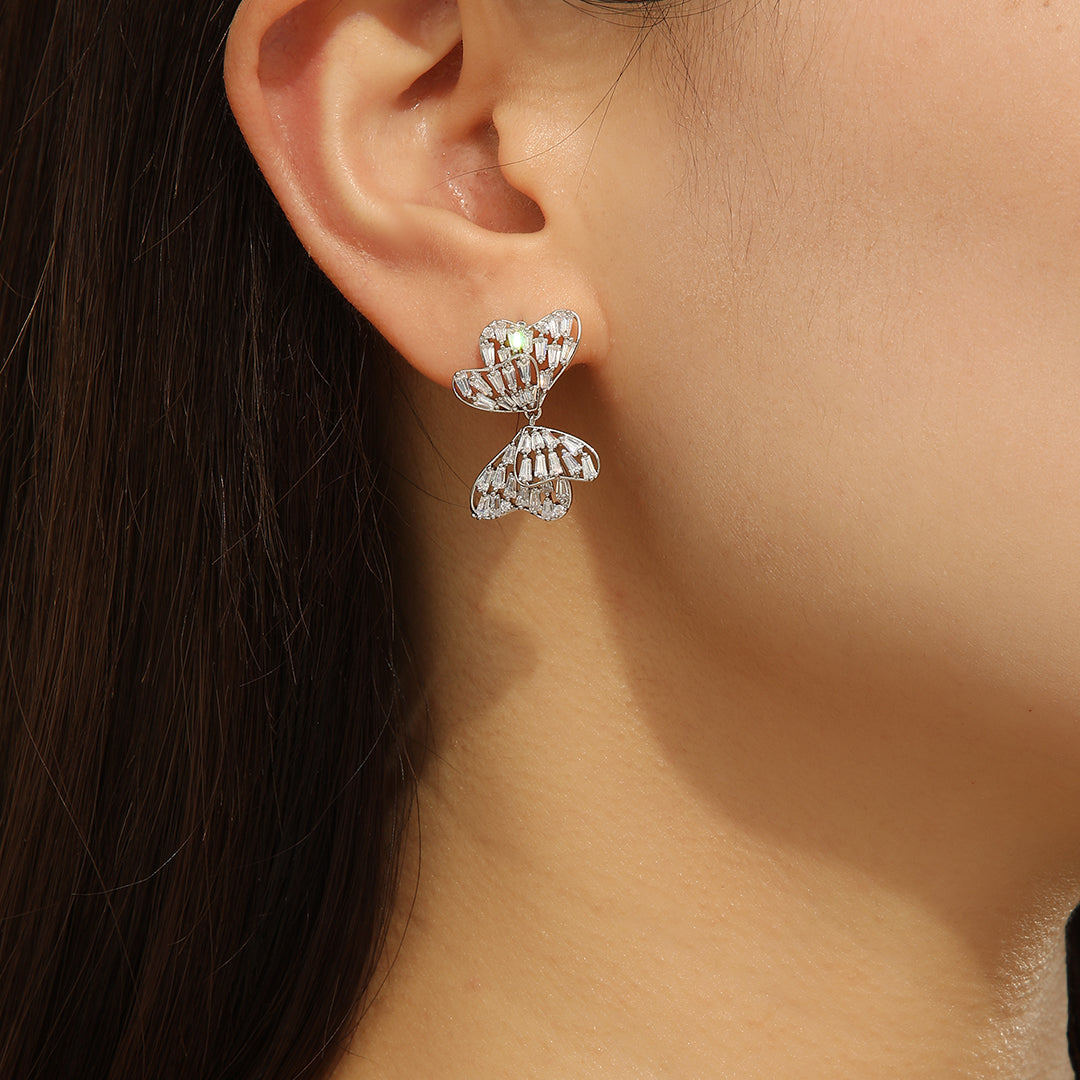 Alluring Silver Bow  Symphony Earrings - Reet Pehal