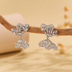 Load image into Gallery viewer, Alluring Silver Bow  Symphony Earrings - Reet Pehal
