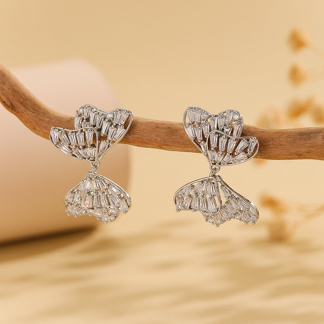 Alluring Silver Bow  Symphony Earrings - Reet Pehal