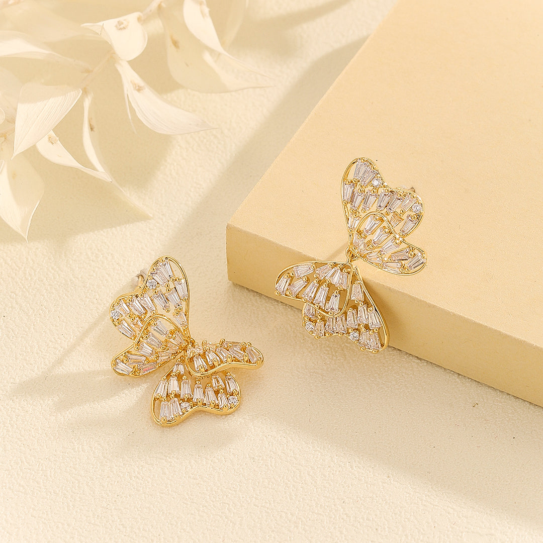 Alluring Golden Bow  Symphony Earrings - Reet Pehal