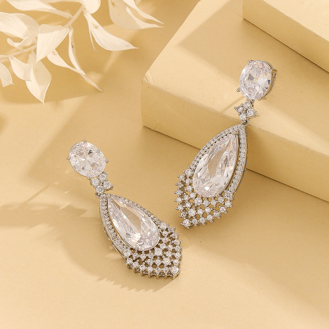 Glistening Silver Halo Pear Earring - Reet Pehal