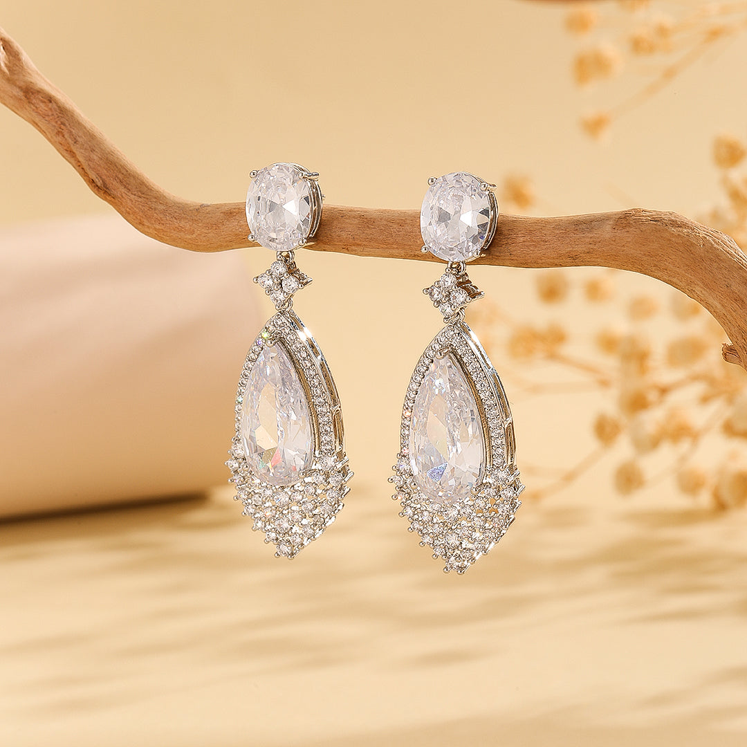 Glistening Silver Halo Pear Earring - Reet Pehal