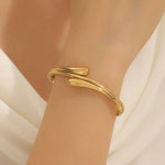 Load image into Gallery viewer, Luxe Wave Crossover Bangle
