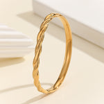 Load image into Gallery viewer, Sophisticated Twirl Bangle
