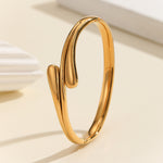 Load image into Gallery viewer, Luxe Wave Crossover Bangle
